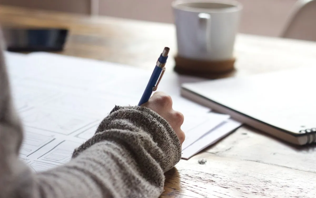 A student reviewing study costs and planning expenses