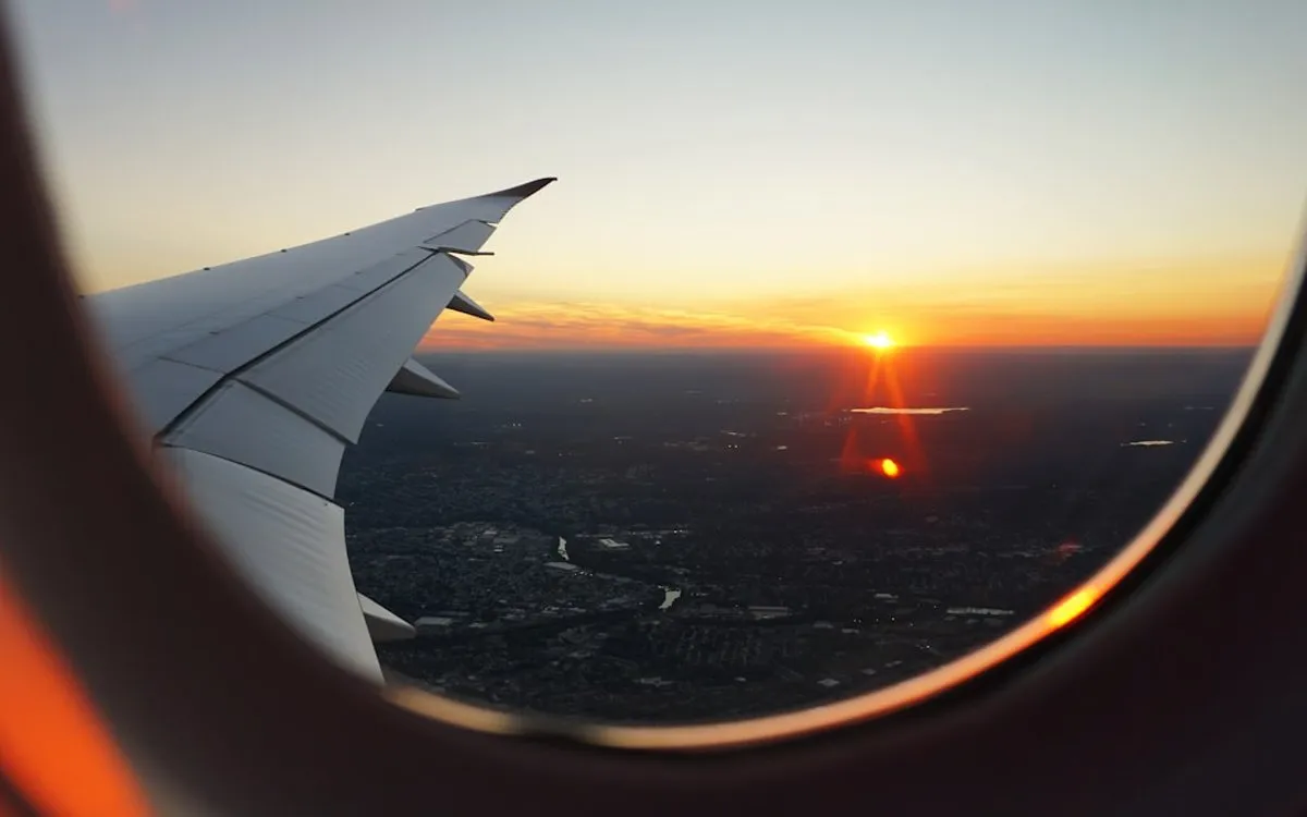 A student checking travel and study documents before departure